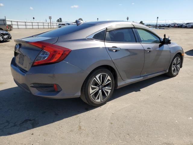 Photo 3 from auction – 2016 HONDA CIVIC EXL with VIN 2HGFC1F74GH646502