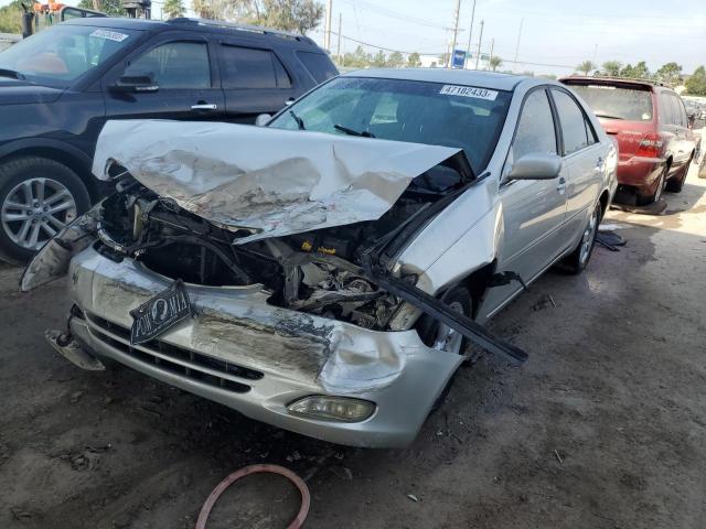 TOYOTA CAMRY LE 2003 with VIN 4T1BF30K63U564321 - Photo from auction