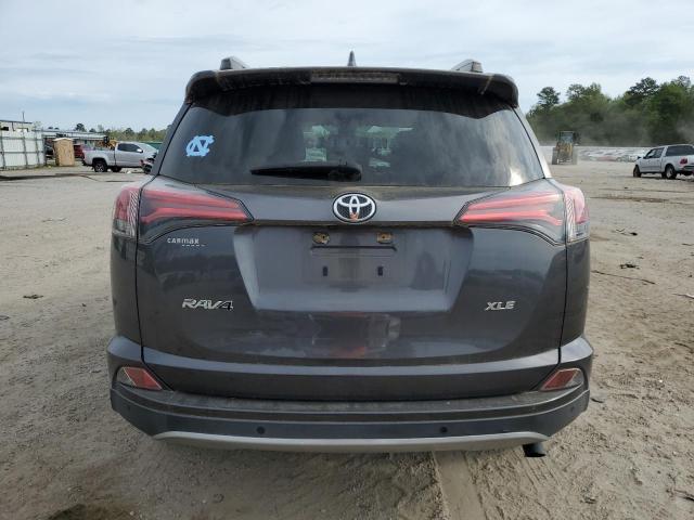 Photo 6 from auction – 2018 TOYOTA RAV4 LE with VIN JTMWFREV2JJ153573