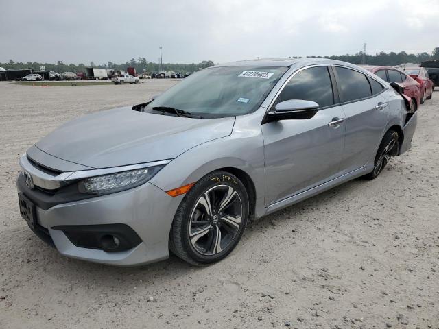 HONDA CIVIC TOUR 2018 with VIN JHMFC1F96JX010097 - Photo from auction