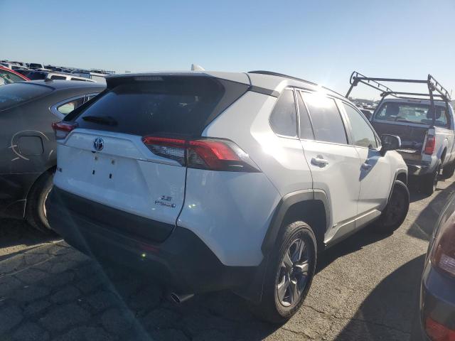 Photo 3 from auction – 2022 TOYOTA RAV4 LE with VIN JTMMWRFV2ND144141