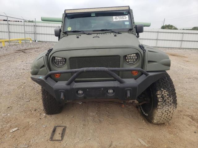 Photo 5 from auction – 2011 JEEP WRANGLER U with VIN 1J4HA5H12BL632911