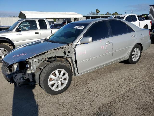 Photo 1 from auction – 2003 TOYOTA CAMRY LE with VIN 4T1BF30K93U055078