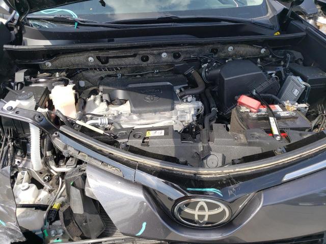 Photo 11 from auction – 2018 TOYOTA RAV4 LE with VIN JTMZFREV7JJ743569