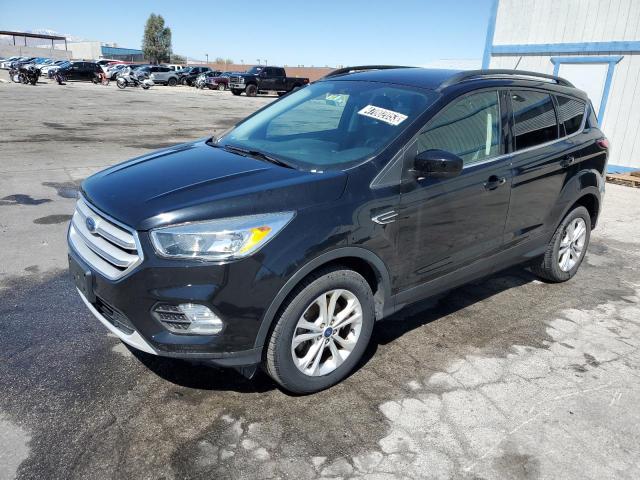 Photo 1 from auction – 2018 FORD ESCAPE SE with VIN 1FMCU9GD9JUA59441
