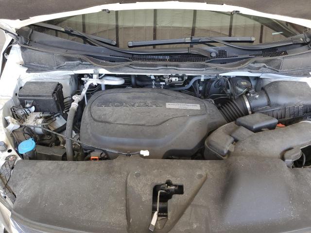 Photo 12 from auction – 2018 HONDA ODYSSEY with VIN 5FNRL6H73JB040031