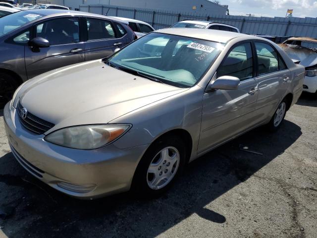TOYOTA CAMRY LE 2002 with VIN 4T1BF30K42U521899 - Photo from auction