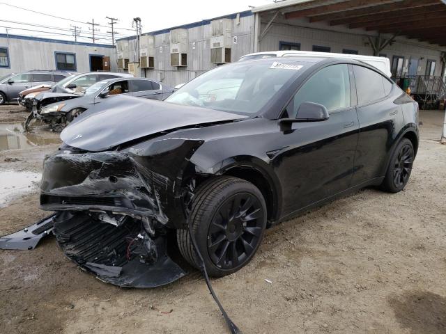 TESLA MODEL Y 2023 with VIN 7SAYGDEE9PA051647 - Photo from auction