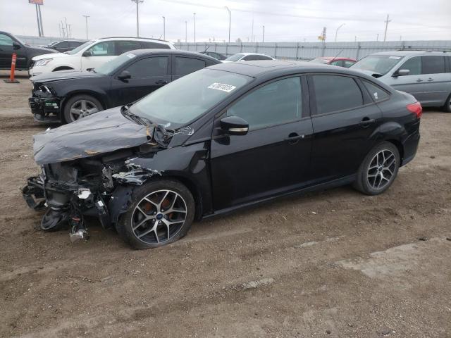 FORD FOCUS SEL 2017 with VIN 1FADP3H26HL328849 - Photo from auction