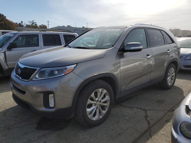 KIA SORENTO EX 2014 with VIN 5XYKUDA73EG497658 - Photo from auction