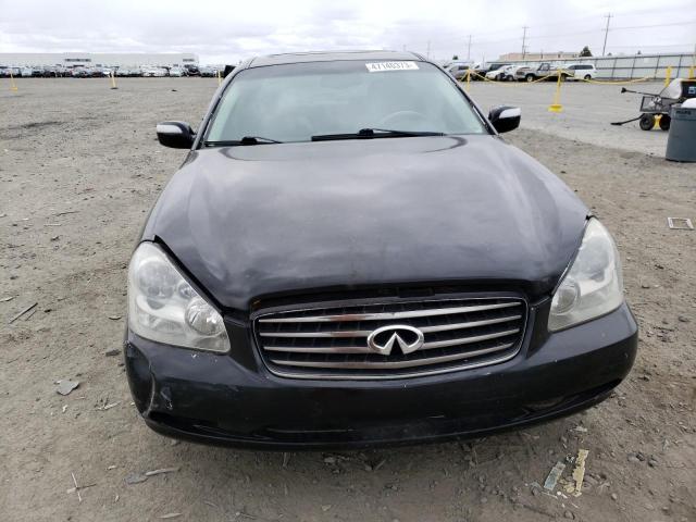 Photo 5 from auction – 2002 INFINITI Q45 with VIN JNKBF01AX2M001052