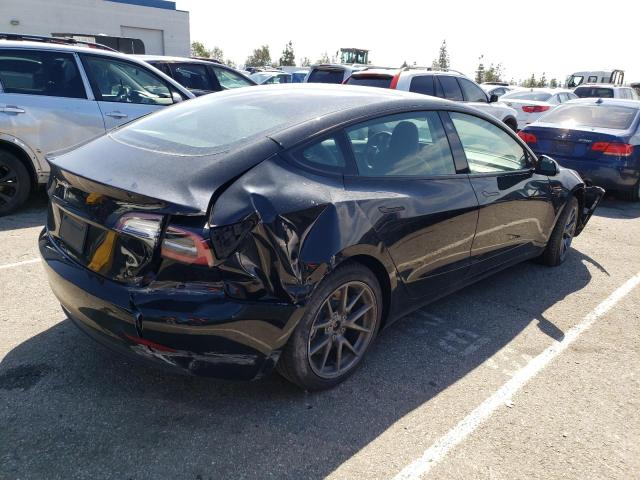 Photo 4 from auction – 2021 TESLA MODEL 3 with VIN 5YJ3E1EA0MF095351