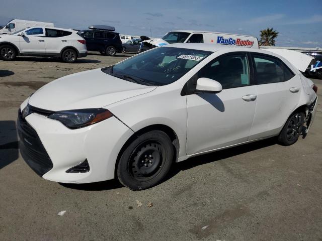 TOYOTA COROLLA 2018 with VIN 5YFBURHE3JP806830 - Photo from auction