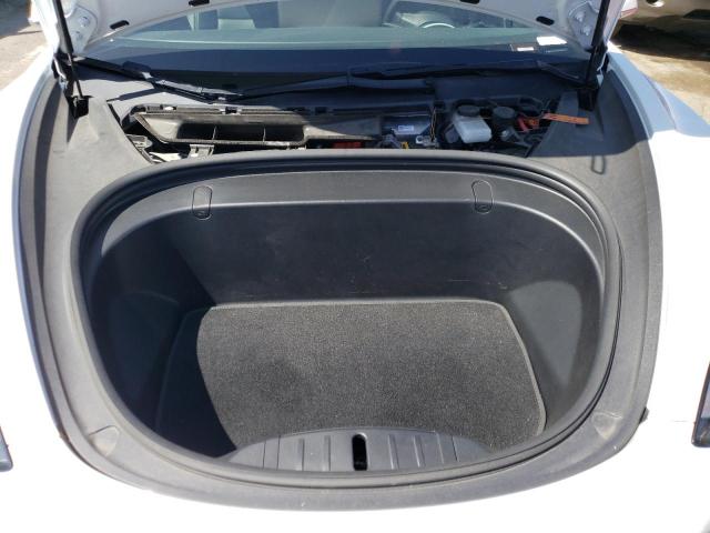 Photo 11 from auction – 2018 TESLA MODEL 3 with VIN 5YJ3E1EA8JF049004