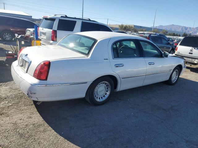 Photo 3 from auction – 2000 LINCOLN TOWN CAR E with VIN 1LNHM81W1YY908572