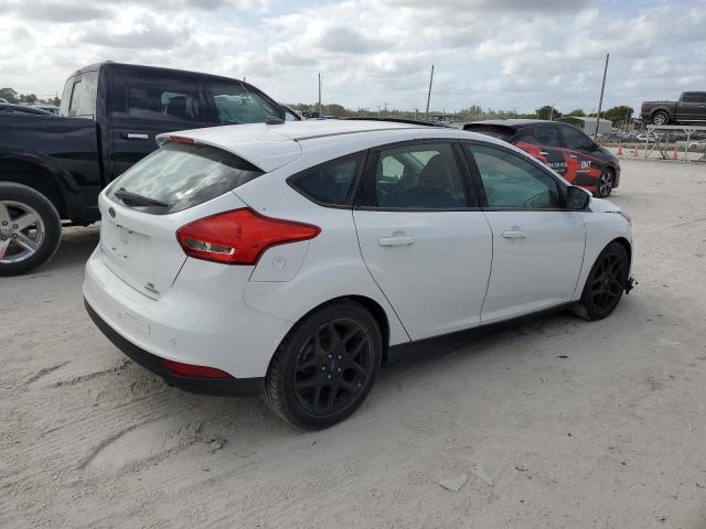 Photo 3 from auction – 2016 FORD FOCUS SE with VIN 1FADP3K28GL340007