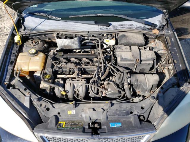 Photo 11 from auction – 2007 FORD FOCUS ZX4 with VIN 1FAHP34NX7W148353