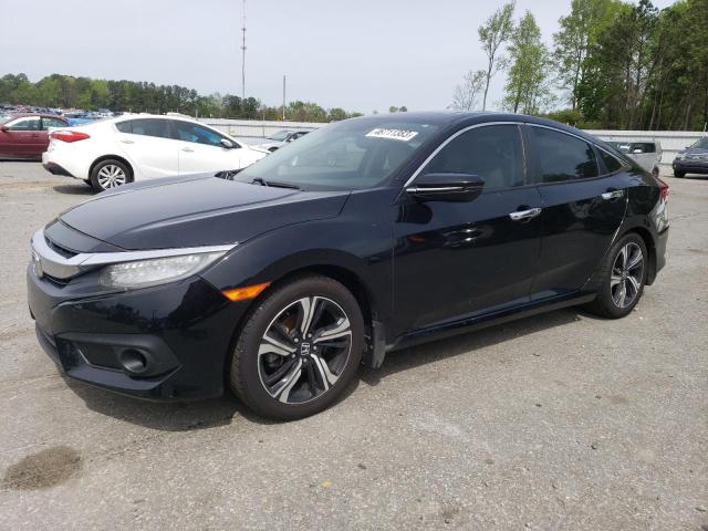 HONDA CIVIC TOUR 2017 with VIN 19XFC1F96HE027705 - Photo from auction