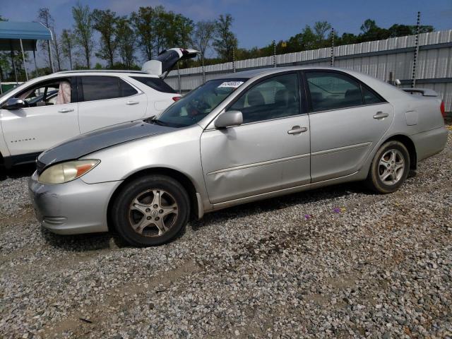 TOYOTA CAMRY LE 2002 with VIN 4T1BE32K12U593997 - Photo from auction