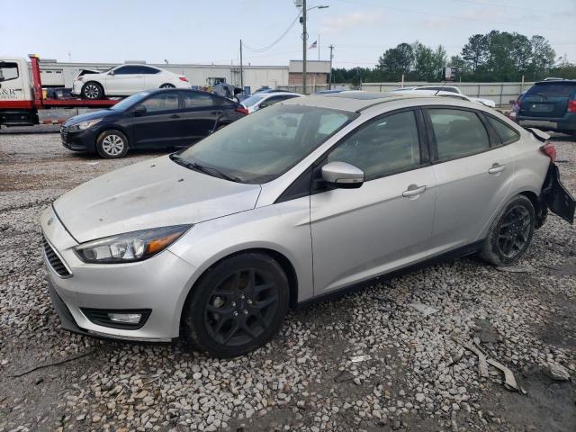 FORD FOCUS SE 2016 with VIN 1FADP3F25GL256690 - Photo from auction