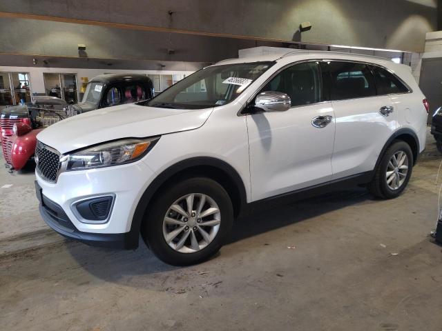 KIA SORENTO LX 2016 with VIN 5XYPG4A56GG017997 - Photo from auction