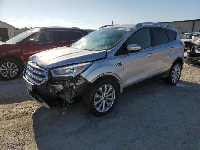 FORD ESCAPE TIT 2017 with VIN 1FMCU0JD0HUC73040 - Photo from auction
