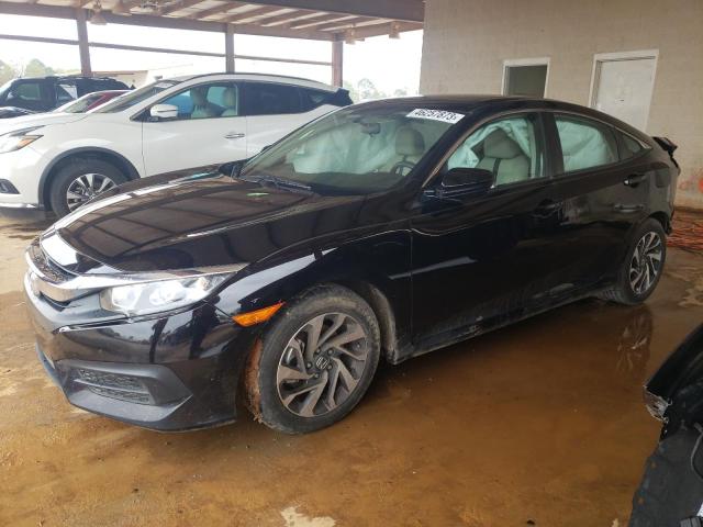 HONDA CIVIC EX 2018 with VIN 19XFC2F79JE010889 - Photo from auction