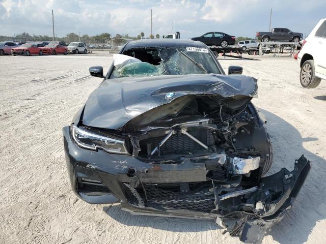 Photo 5 from auction – 2022 BMW 330I with VIN 3MW5R1J07N8C67601