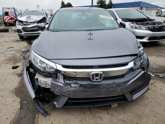 Photo 5 from auction – 2017 HONDA CIVIC LX with VIN 19XFC2F57HE033239