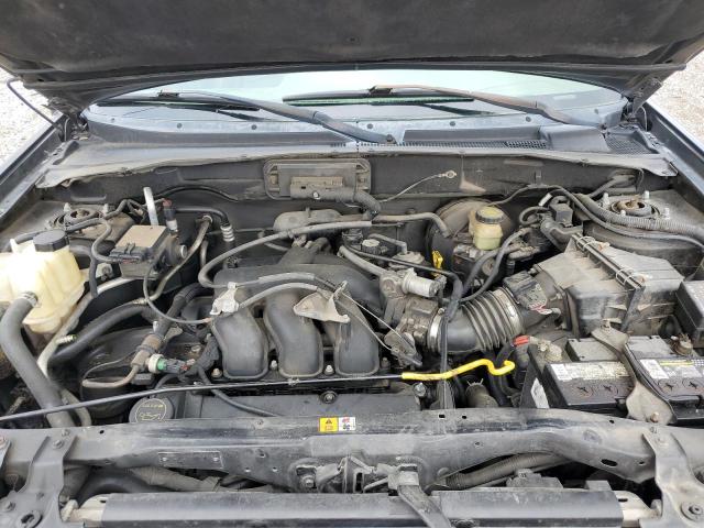 Photo 12 from auction – 2002 MAZDA TRIBUTE LX with VIN 4F2CU08122KM58614