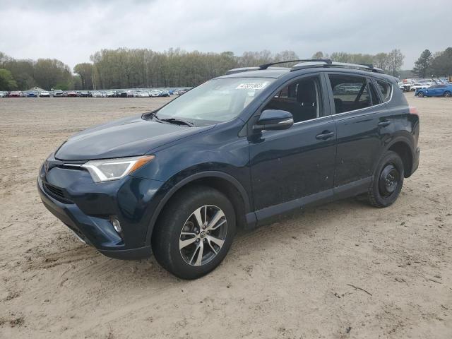 TOYOTA RAV4 XLE 2017 with VIN 2T3WFREV1HW355946 - Photo from auction
