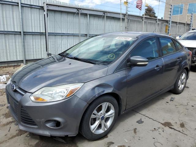 FORD FOCUS SE 2014 with VIN 1FADP3F21EL419011 - Photo from auction