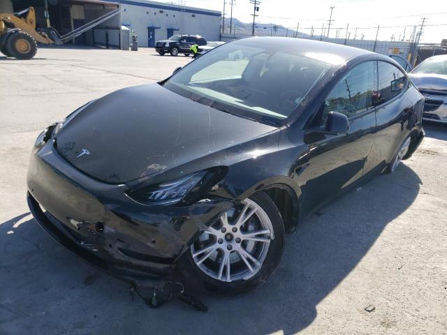 TESLA MODEL Y 2021 with VIN 5YJYGAEE9MF269632 - Photo from auction