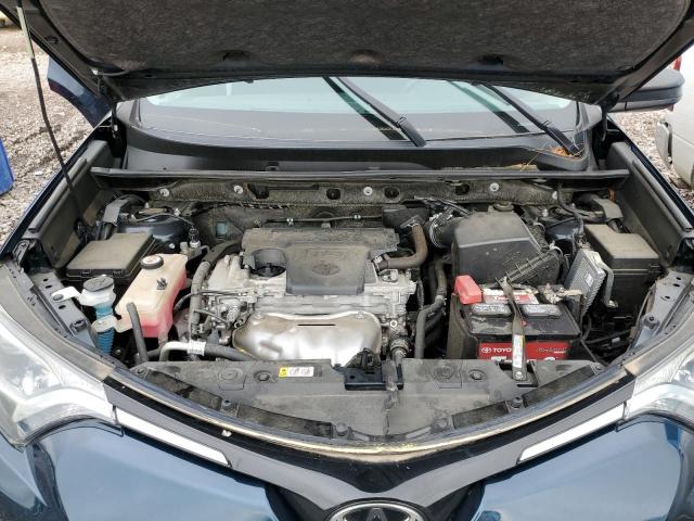 Photo 11 from auction – 2018 TOYOTA RAV4 LE with VIN JTMZFREV4JJ187527