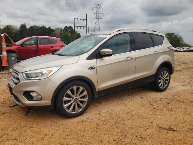 FORD ESCAPE TIT 2017 with VIN 1FMCU9J98HUB08305 - Photo from auction