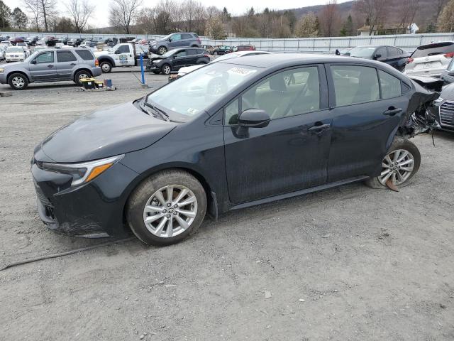TOYOTA COROLLA LE 2023 with VIN JTDBCMFE9P3005815 - Photo from auction