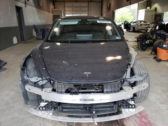 Photo 5 from auction – 2021 TESLA MODEL 3 with VIN 5YJ3E1EB3MF992236