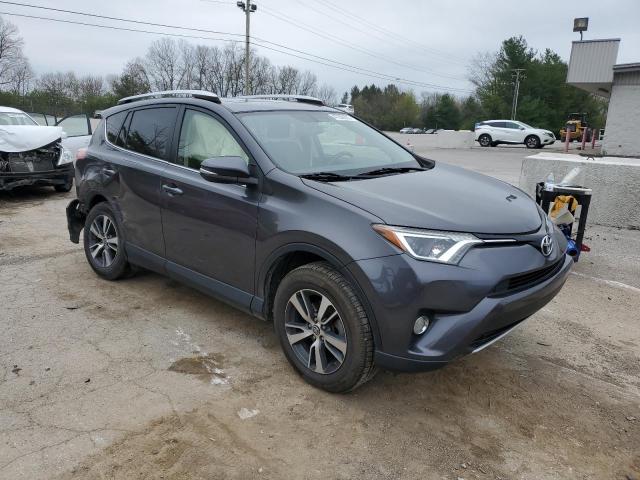 Photo 4 from auction – 2016 TOYOTA RAV4 XLE with VIN JTMRFREV5GJ098509