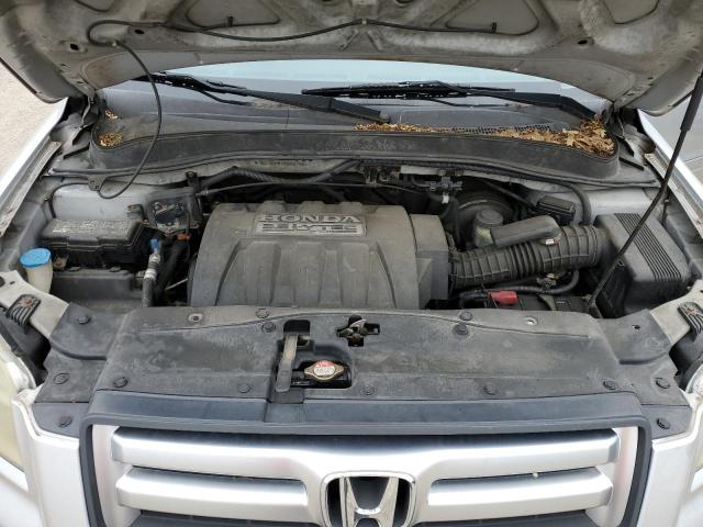 Photo 12 from auction – 2006 HONDA PILOT LX with VIN 5FNYF281X6B017585