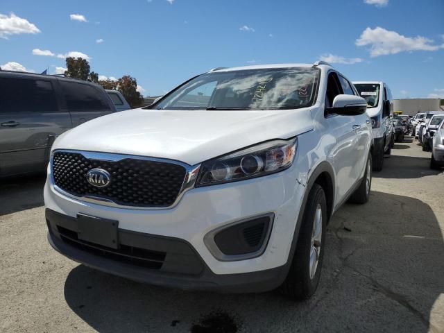 KIA SORENTO LX 2016 with VIN 5XYPGDA5XGG096770 - Photo from auction
