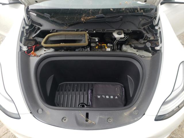 Photo 11 from auction – 2020 TESLA MODEL Y with VIN 5YJYGDEE9LF015659