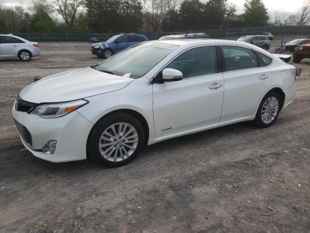 TOYOTA AVALON HYB 2014 with VIN 4T1BD1EB0EU019768 - Photo from auction