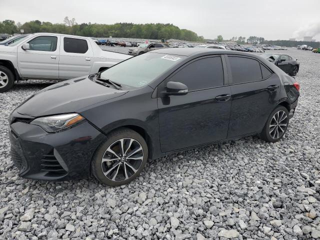 TOYOTA COROLLA L 2018 with VIN 5YFBURHE6JP807115 - Photo from auction