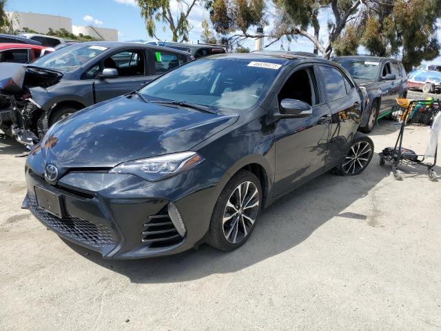 TOYOTA COROLLA L 2018 with VIN 2T1BURHE4JC116276 - Photo from auction