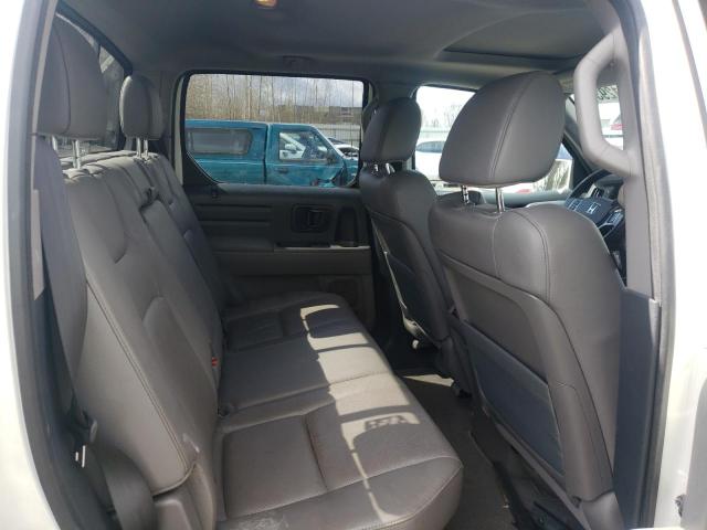 Photo 11 from auction – 2014 HONDA RIDGELINE with VIN 5FPYK1F58EB002553