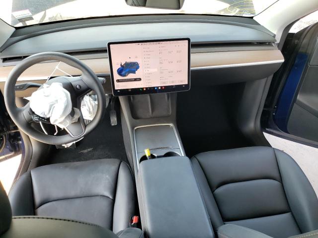 Photo 8 from auction – 2022 TESLA MODEL Y with VIN 7SAYGDEE2NF371800