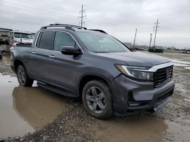 Photo 4 from auction – 2022 HONDA RIDGELINE with VIN 5FPYK3F79NB006852