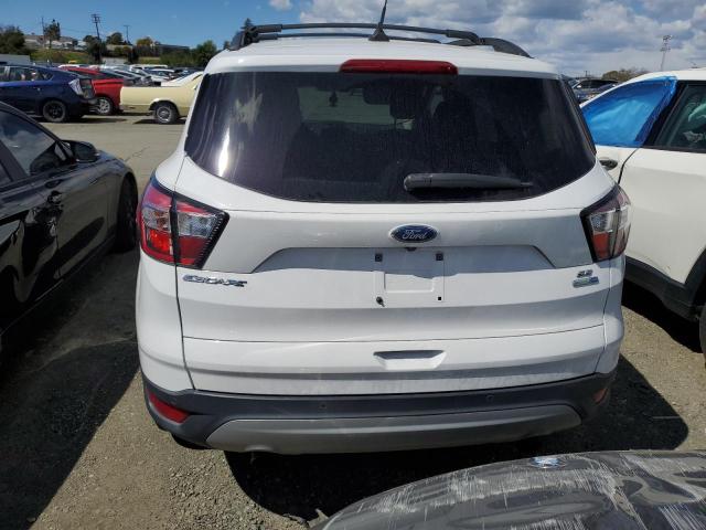 Photo 6 from auction – 2018 FORD ESCAPE SE with VIN 1FMCU9GD0JUC37592
