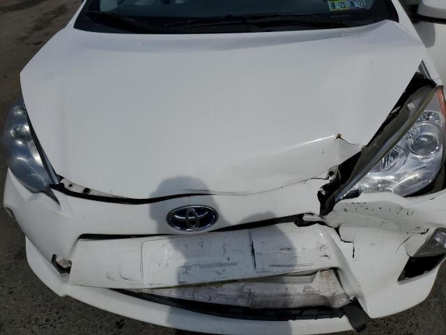 Photo 11 from auction – 2014 TOYOTA PRIUS C with VIN JTDKDTB37E1066780