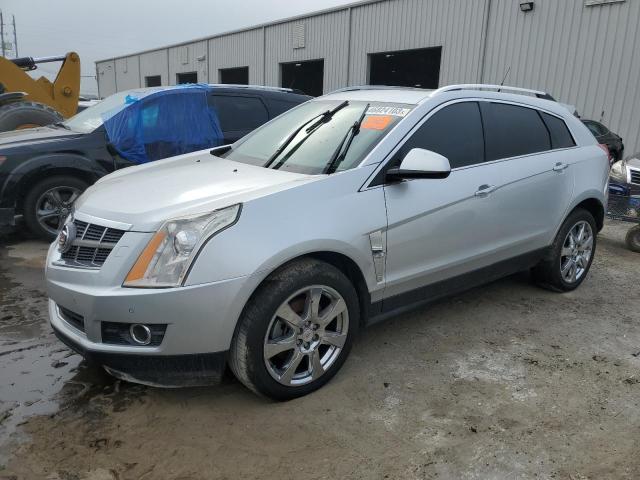 CADILLAC SRX PERFOR 2012 with VIN 3GYFNBE31CS590582 - Photo from auction